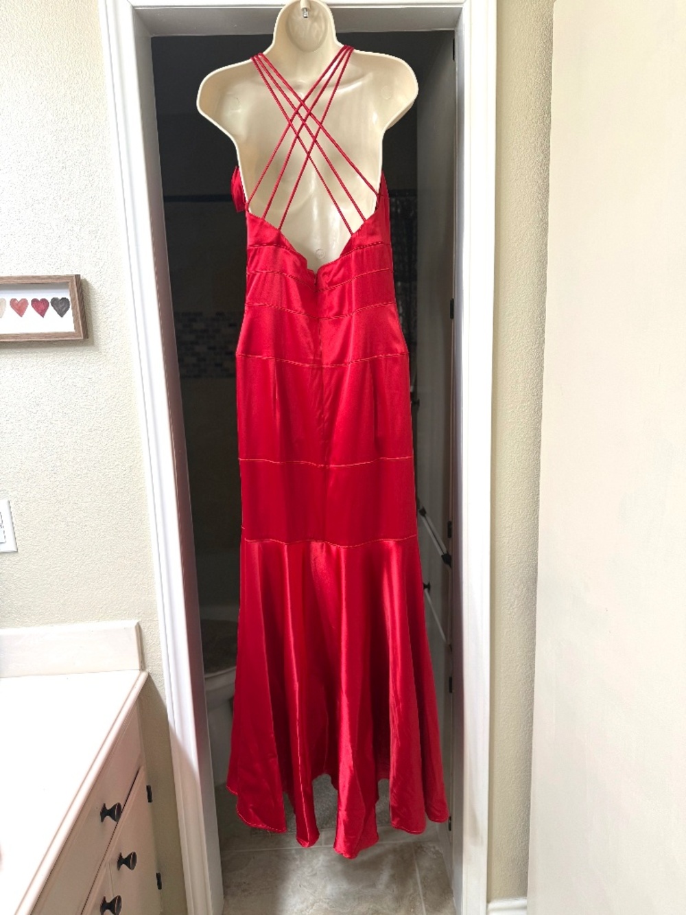 Red maxi evening gown with small rose accent